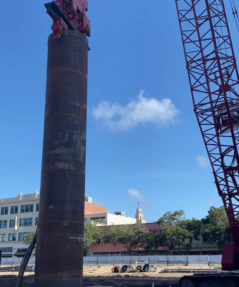 Steel casing installation at construction site with vibration and noise monitoring services