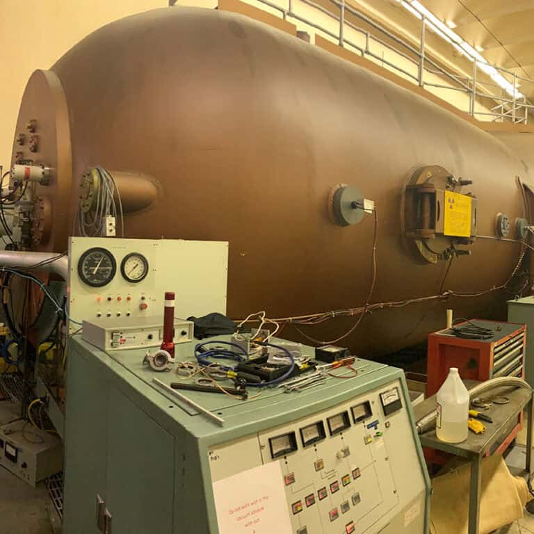 Low level vibration monitoring near sensitive laboratory vacuum chamber equipment